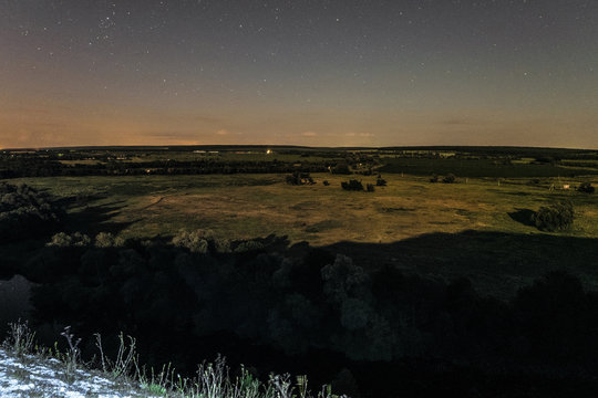 View of green forest-steppe plain at night. River Koren (Root) valley, typical landscape of Belgorod region, Russia.