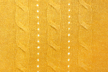 yellow knitting wool background. Knitted Fabric Texture. top view
