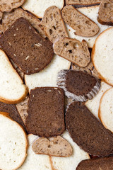 Many slices of bread as background. Top view