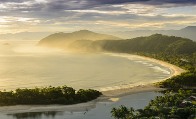 Spectacular sunset on the Barra do Una beach on the coast of the state of Sao Paulo , Brazil