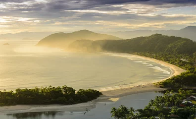 Foto op Canvas Spectacular sunset on the Barra do Una beach on the coast of the state of Sao Paulo , Brazil © napior