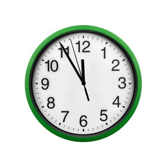 Green wall clock isolated on a white background.