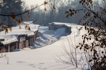 garages in the snow on a winter day
