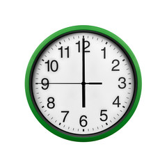 Green wall clock isolated on a white background.