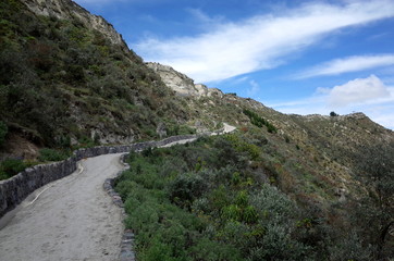A mountain track winds through the Ecuadorian Andes on the Quilotoa Loop hike