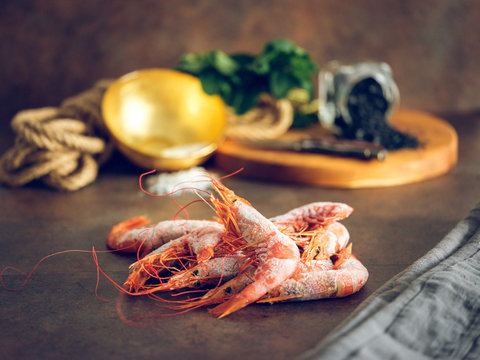 Frozen shrimps on table