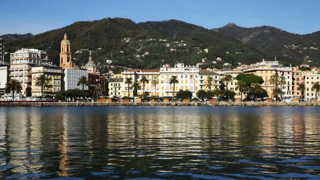 View of small scenic town of Rapallo with castle on Ligurian Sea coast of Italy