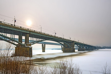 Indoor metro bridge and road of the October bridge across the Ob river. Novosibirsk, Russia