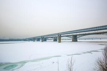Indoor metro bridge and road of the October bridge across the Ob river. Novosibirsk, Russia