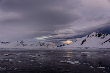 Antarctic landscape with glacier and mountains
