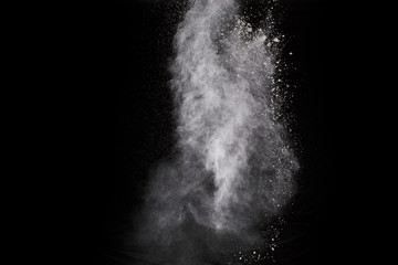 White powder on black background.