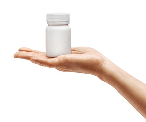 Man's hand holding medical bottle with pills isolated on white background. Palm up, close up. High resolution product
