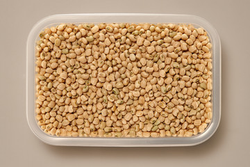 Whole Grains. Top View of Healthy grain foods in a White bowl on grey background with Real Shadow.