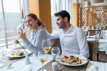 Couple having lunch at rustic gourmet restaurant