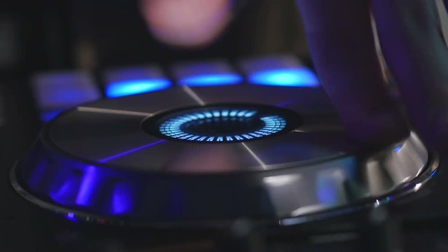 Man hands playing mix on sound board