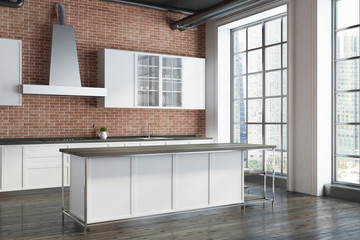 Brick kitchen corner, white countertops