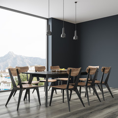 Black dining table with design chairs, side view