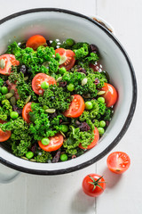 Closeup of salad in chicory with egg, sprouts and avocado