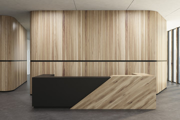 Wooden and black reception in wooden office lobby