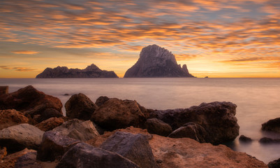 Sunset in Ibiza next to the island of Es vedra
