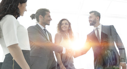 handshake business partners in the office. © ASDF