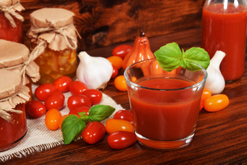 healthy tomato juice with basil made of sweet cocktail tomatoes