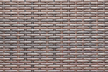 Rattan texture background. Brown rattan wallpaper. Plastic rattan close up.