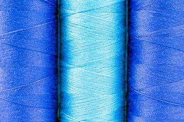 texture blue threads on reels