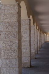 Arcade with stone columns