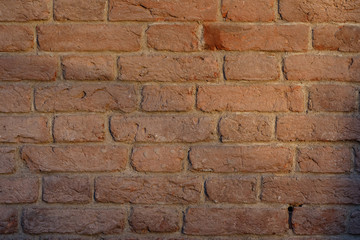 red brick wall texture grunge background with vignetted corners, may use to interior design