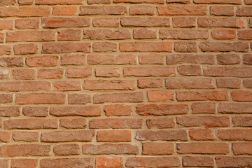 red brick wall texture grunge background with vignetted corners, may use to interior design