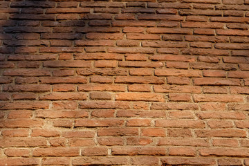 red brick wall texture grunge background with vignetted corners, may use to interior design