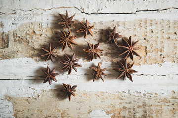 food flavoring star anise on wooden background