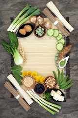 Macrobiotic diet food background with tofu, udon and sobu noodles, miso paste, grains, legumes,...