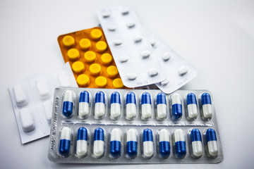 Various pills, medication isolated on white backround
