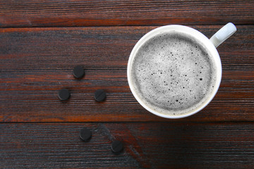 Coal latte. Black cappuccino. Black coffee with activated carbon.