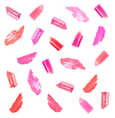 Collage of Lipsticks and Smears in Various Colors on a White Background