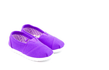 Pair of Purple Children's Shoes on a White Background