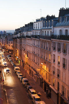 Sunset cityscape of a street in Paris, France