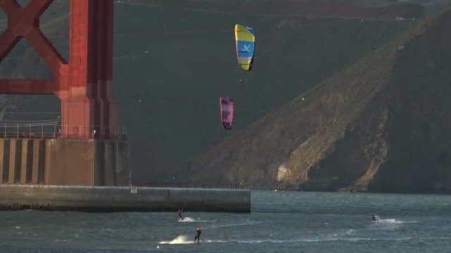 Kiteboarding at Golden Gate Bridge. Constant Wind makes the waters around San Francisco's Golden Gate Bridge a perfect Wind Surfing location