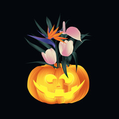 Carved Halloween pumpkin head jack lantern decorated with palm leaves, Bird of paradise and tulip flowers