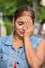 Sad Colombian Adult Female Wearing Jeans Jacket