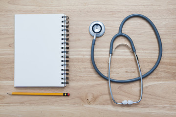 Doctor tool stethoscope on table background