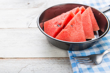 Watermelon on wooden table background