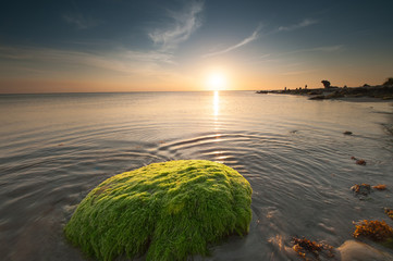 Sunset seascape with beautiful sky at Terongkongan Beach, Sabah Malaysia. image contain soft focus...