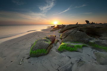 Sunset seascape with beautiful sky at Terongkongan Beach, Sabah Malaysia. image contain soft focus...
