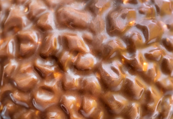 Texture of chocolate candy as abstract background. Close up.