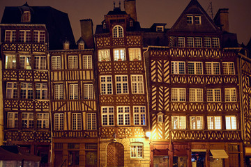Row of crooked medieval houses in Rennes city, France.