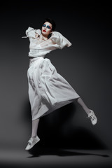 stylish girl jumping