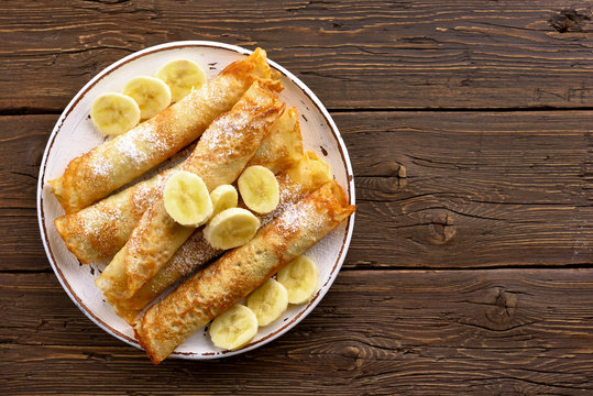 Crepes roll with banana slices